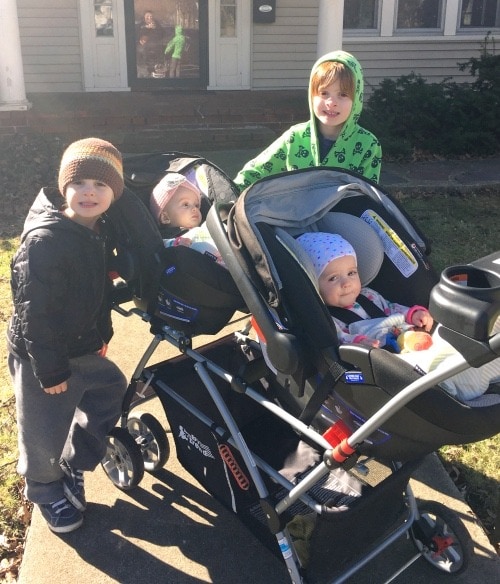 two kids and babies in stroller social life