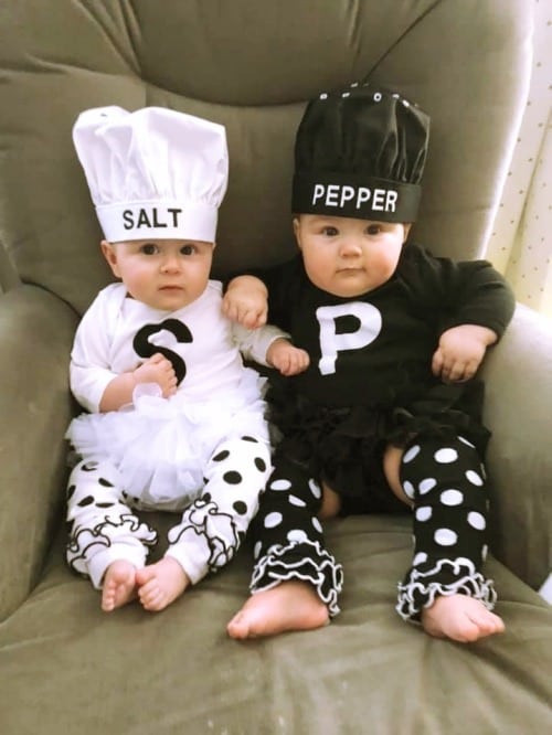 twin babies dressed up as salt and pepper shakers