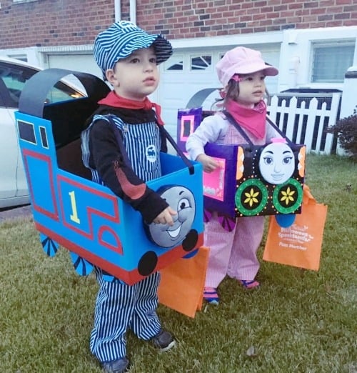 twin toddlers dressed as Thomas the Train characters