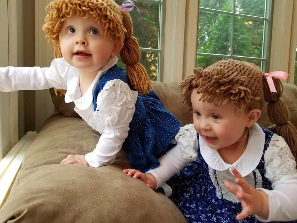 twin baby girls dressed up as cabbage patch kids