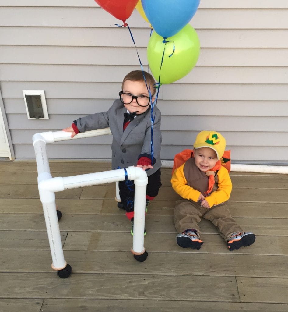 toddler twin boys dressed like characters from the Disney/Pixar movie UP