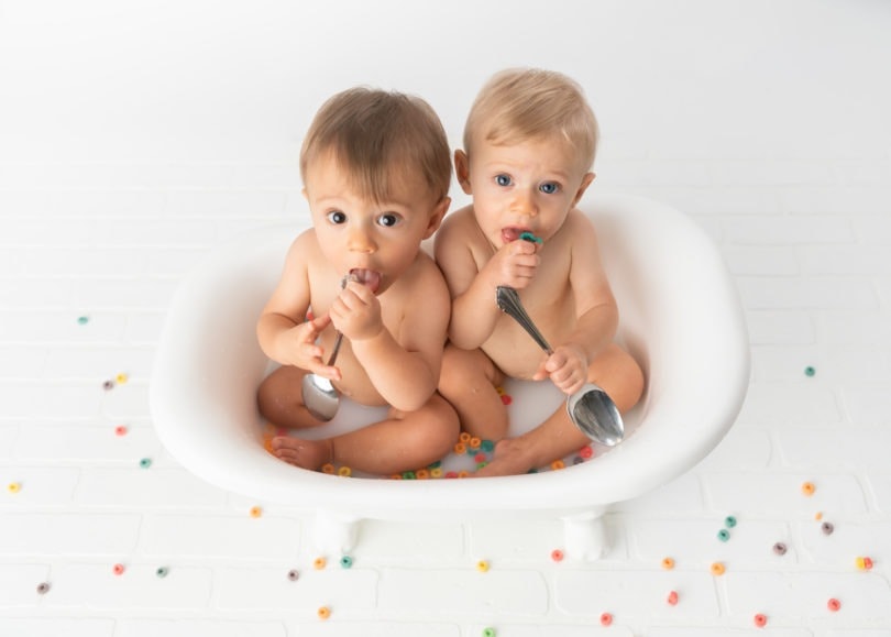 twin boys in a big cereal bowl new parents of twins