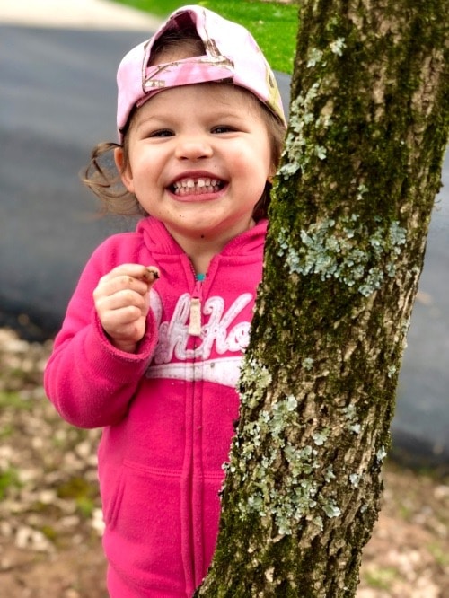 little girl with tree welcome spring