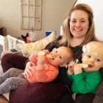 mom holding twins stay at home mom