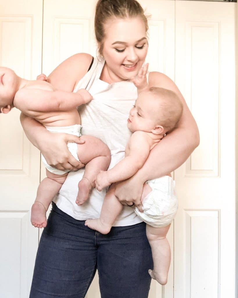 mom holding twins Being a Twin Mom