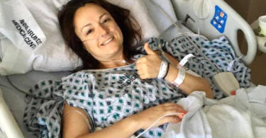 woman in a hospital bed uterine prolapse surgery
