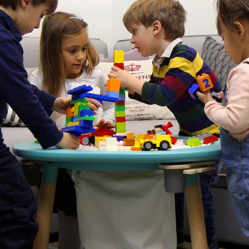 kids playing with legos on the mu table toys that twins can share