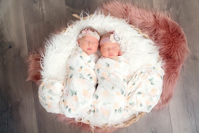 pros and cons of twins newborn twins in basket