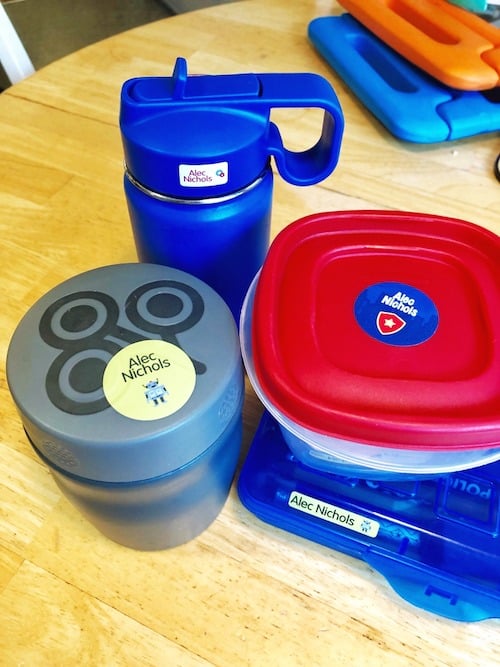 lunch food containers on a kitchen table get organized