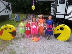 Mom and Dad as Pac-man and Mrs. Pac-man and the kids as ghosts