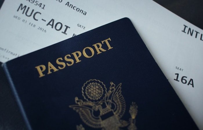a passport and plane ticket for air travel