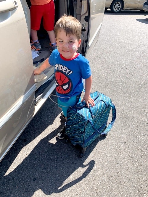 portable oxygen tank and boy