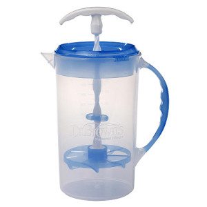 a clear formula pitcher with a blue handle