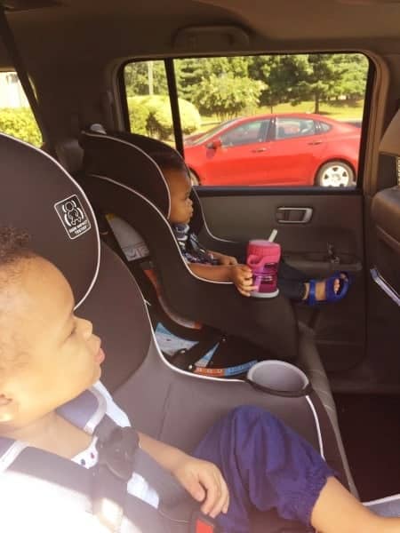 twin toddlers in car seats road trips with twins