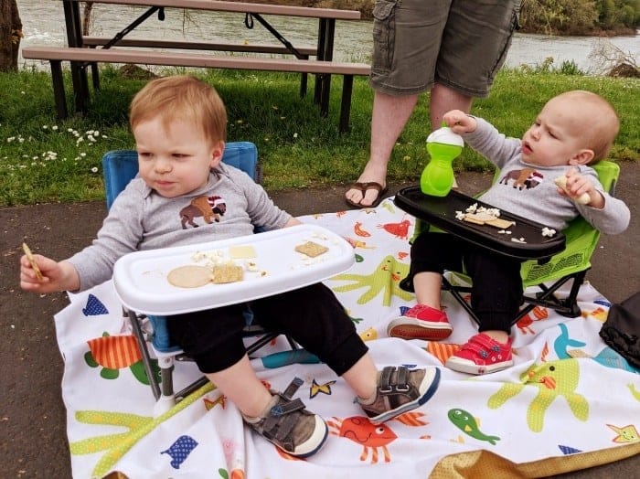 toddler twins eating lunch at rest stop road trips with twins