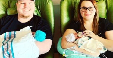 parents holding babies in nicu signs of preterm labor