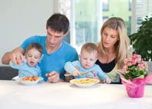 parents and toddlers eating Get Your Kids to Eat