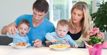 parents and toddlers eating Get Your Kids to Eat