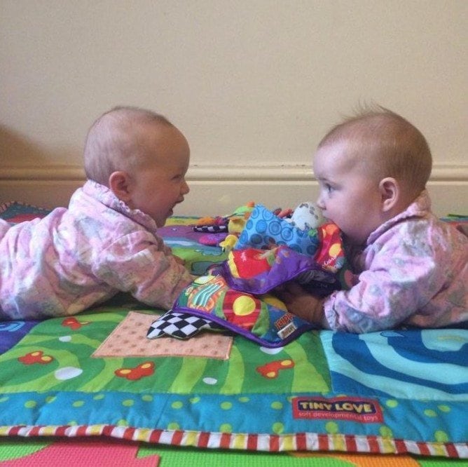 twins on a blanket twin milestones