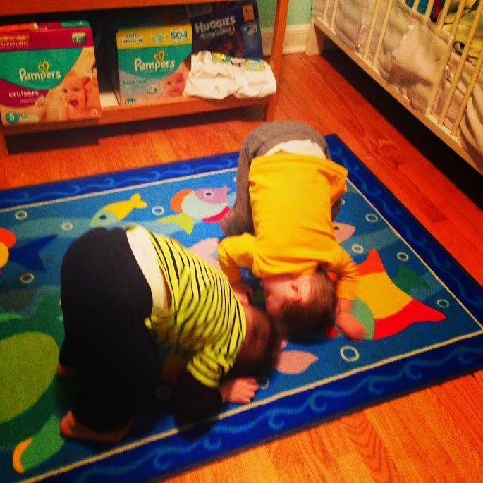 toddler twins doing headstand having twins totally rocks